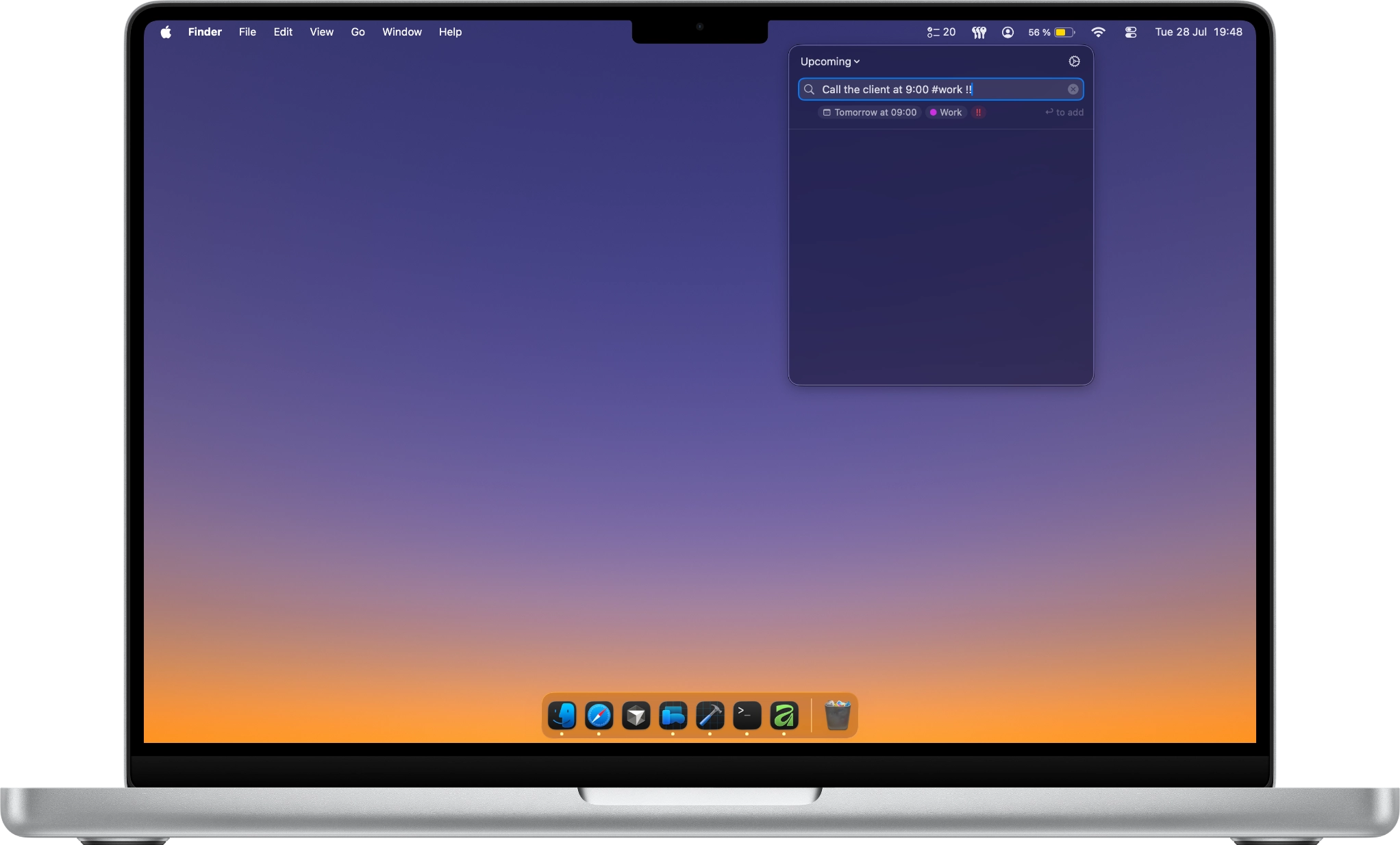 Perch on a MacBook, composing a reminder in plain language